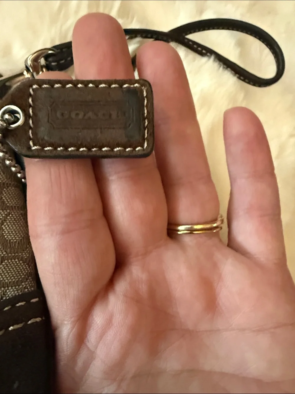 Coach Signature Canvas Wristlet in Brown and Tan